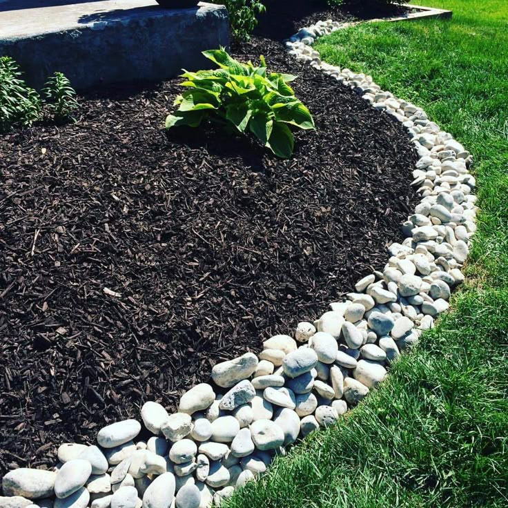 Mulch and gravel bed landscaping